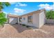 Side view of a single-story home with easy-care desert landscaping at 5222 Joshua Jose St, North Las Vegas, NV 89031