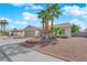 Attractive single-story home with low maintenance desert landscaping and a two-car garage at 5222 Joshua Jose St, North Las Vegas, NV 89031
