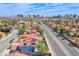 Elevated view of a residential area highlighting the city skyline with well-maintained streets and greenery at 5301 Kalmia Dr, Las Vegas, NV 89103