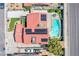 Aerial view of a home featuring a red tile roof with solar panels and a backyard pool with lounge area at 5301 Kalmia Dr, Las Vegas, NV 89103