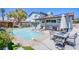 Inviting backyard with a private pool, covered patio, outdoor kitchen, and dining area at 5301 Kalmia Dr, Las Vegas, NV 89103