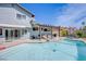 Enjoy this backyard oasis with a pool, outdoor kitchen, covered patio, and sliding doors to the interior at 5301 Kalmia Dr, Las Vegas, NV 89103