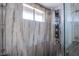 Modern bathroom with tiled walk-in shower and sleek fixtures, creating a spa-like experience at 5301 Kalmia Dr, Las Vegas, NV 89103