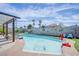 The inviting pool is complete with a volleyball net, basketball hoop, and lounge chairs at 5301 Kalmia Dr, Las Vegas, NV 89103