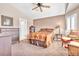 Comfortable bedroom with a cozy bed, dresser, and a neutral color scheme with carpet flooring at 5681 Harbour Pointe Ave, Las Vegas, NV 89122