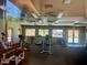 Well-equipped fitness center with modern machines and ample natural light at 5681 Harbour Pointe Ave, Las Vegas, NV 89122