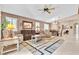 Spacious living room with neutral tones, comfortable seating, and an open layout for modern living at 5681 Harbour Pointe Ave, Las Vegas, NV 89122