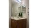 Bathroom featuring a single sink vanity with a large mirror at 5904 Oakton St, Las Vegas, NV 89130