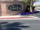 The Eagle Creek community entrance sign is surrounded by flowerbeds and landscaping at 5904 Oakton St, Las Vegas, NV 89130