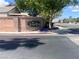 An attractive Eagle Creek community sign set in landscaping and flowerbeds along the road at 5904 Oakton St, Las Vegas, NV 89130