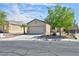 Charming single-story home with a two-car garage and well-maintained front yard at 5904 Oakton St, Las Vegas, NV 89130