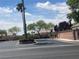 Neighborhood street view featuring mature landscaping and well-maintained homes under a sunny sky at 5904 Oakton St, Las Vegas, NV 89130