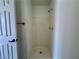 Practical bathroom features a stand-up shower and neutral-colored walls, offering a blank canvas at 5928 Willard St, Las Vegas, NV 89122