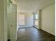 Cozy bedroom featuring ample natural light, complemented by modern floors, and a neutral color palette at 5928 Willard St, Las Vegas, NV 89122