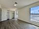 Bedroom with wood floors, closet and window at 5928 Willard St, Las Vegas, NV 89122