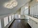 Spacious living room featuring wood floors and a modern light fixture at 5928 Willard St, Las Vegas, NV 89122