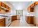 Efficient kitchen featuring tile countertops and flooring, and traditional cabinetry at 6149 Elderberry Wine Ave, Las Vegas, NV 89142