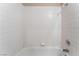 Close-up of a tiled shower-over-tub combination in a bathroom at 6149 Elderberry Wine Ave, Las Vegas, NV 89142