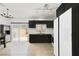 Modern kitchen with an eat-in kitchen area and backyard access at 6314 Shadow Moon Pl, North Las Vegas, NV 89031