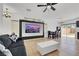 Bright living room and dining area featuring tile flooring and recessed lighting at 6314 Shadow Moon Pl, North Las Vegas, NV 89031