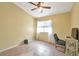 Bedroom featuring a ceiling fan, window with blinds, and neutral-toned walls at 635 Dry Valley Ave, North Las Vegas, NV 89031
