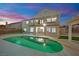 Home featuring a backyard pool and large patio for entertaining at 6927 Adobe Villa Ave, Las Vegas, NV 89142