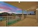 Upstairs balcony with views of the pool and city lights at 6927 Adobe Villa Ave, Las Vegas, NV 89142