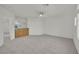 Spacious bedroom with ceiling fan and partial wet bar near ensuite bathroom at 6927 Adobe Villa Ave, Las Vegas, NV 89142
