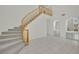 Grand foyer with curved staircase and tile floors at 6927 Adobe Villa Ave, Las Vegas, NV 89142