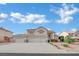 Spacious home with a large driveway and a three-car garage at 6927 Adobe Villa Ave, Las Vegas, NV 89142