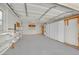 Spacious three-car garage interior with ample storage space at 6927 Adobe Villa Ave, Las Vegas, NV 89142