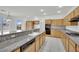 Well-equipped kitchen with granite countertops, ample cabinet space, and modern appliances, perfect for culinary enthusiasts at 6927 Adobe Villa Ave, Las Vegas, NV 89142