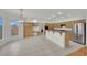 Bright kitchen with granite countertops, abundant cabinet space, and an open layout with an eat-in area at 6927 Adobe Villa Ave, Las Vegas, NV 89142