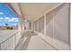 Covered patio with screens offers a seamless transition to the outdoors and beautiful backyard views at 6927 Adobe Villa Ave, Las Vegas, NV 89142