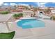 Sparkling pool featuring a pergola, sundeck and lush landscaping creating a backyard oasis at 6927 Adobe Villa Ave, Las Vegas, NV 89142