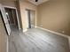 Bedroom with new flooring and access to the bathroom, convenient and comfortable at 7062 Russell Ranch Ave, Las Vegas, NV 89113