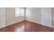 Bedroom featuring hard wood floors, natural light and closet at 7176 Fenway Ave, Las Vegas, NV 89147