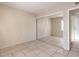 Bedroom with large closet and tile floors at 7176 Fenway Ave, Las Vegas, NV 89147