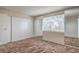 Bedroom with closet and large window at 7176 Fenway Ave, Las Vegas, NV 89147