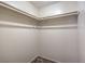 A walk-in closet with metal shelving in the bedroom at 7176 Fenway Ave, Las Vegas, NV 89147