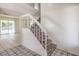 Carpeted staircase with white railing at 7176 Fenway Ave, Las Vegas, NV 89147