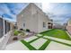 Contemporary two-story home featuring a xeriscaped yard, artificial turf, and modern landscaping at 746 Horizon Canyon Dr, Henderson, NV 89052