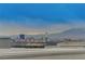 Enjoy panoramic city views from the rooftop, showcasing the vibrant skyline and mountain range at 746 Horizon Canyon Dr, Henderson, NV 89052