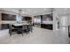 Modern eat-in kitchen featuring stainless steel appliances, black cabinetry, and a large central island at 746 Horizon Canyon Dr, Henderson, NV 89052