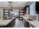 Modern kitchen with an island cooktop and direct access to the workout room at 746 Horizon Canyon Dr, Henderson, NV 89052