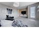 A bright main bedroom boasts modern accents, plush bedding, and ample space for relaxation and comfort at 746 Horizon Canyon Dr, Henderson, NV 89052