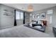 Serene main bedroom featuring a modern platform bed, plush carpet, and minimalist decor at 746 Horizon Canyon Dr, Henderson, NV 89052