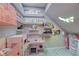 Cozy playroom area featuring a toy kitchen, open shelves, and ample storage at 746 Horizon Canyon Dr, Henderson, NV 89052