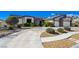 This home has a wide driveway and rock landscaping. Beautiful single story home at 7461 Tahoe Basin Dr, Las Vegas, NV 89129