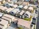 An aerial view shows the density of the community, and the ample parking and solar panels on the homes at 7476 Opal Star St, North Las Vegas, NV 89084